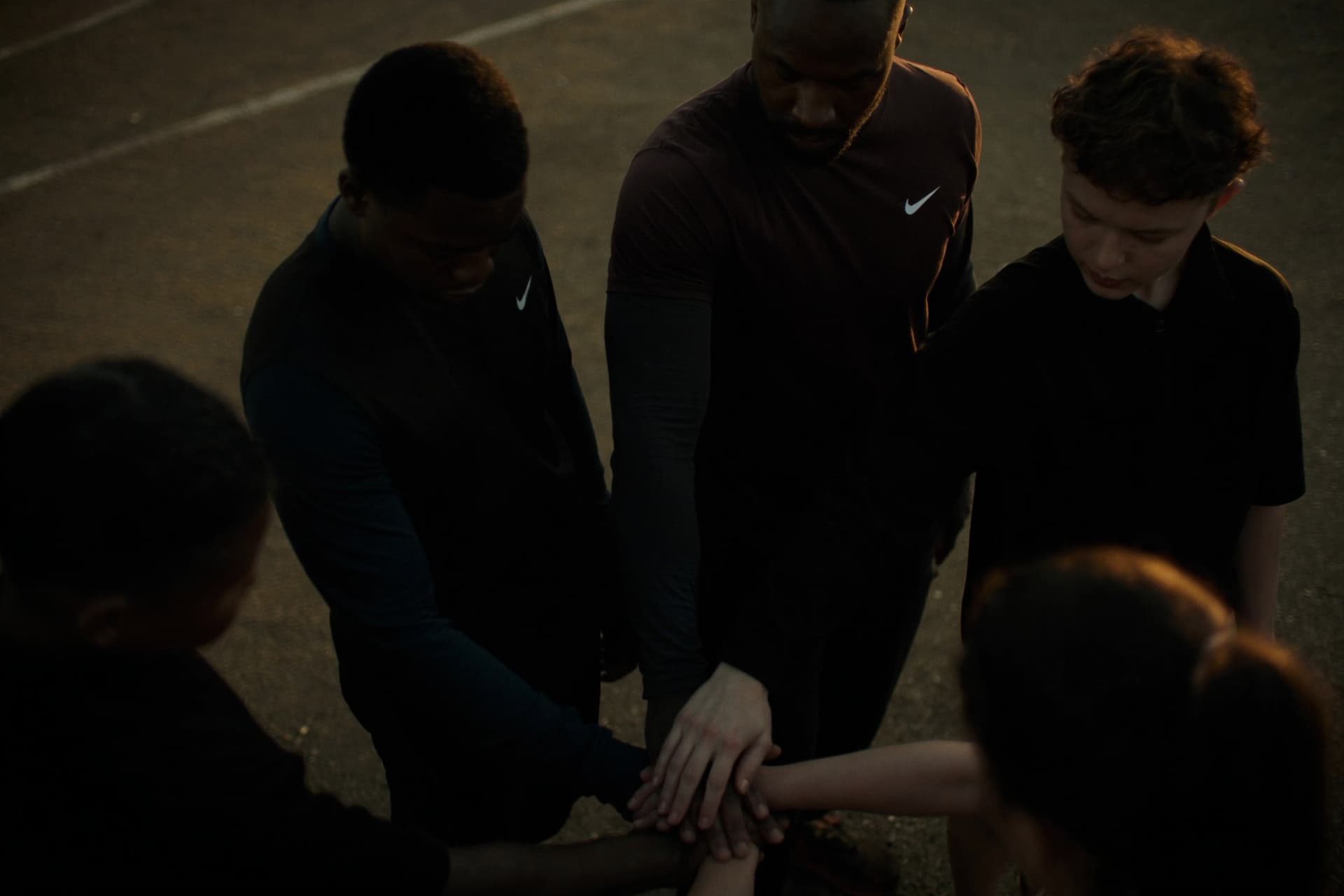 Coach mentoring young athletes